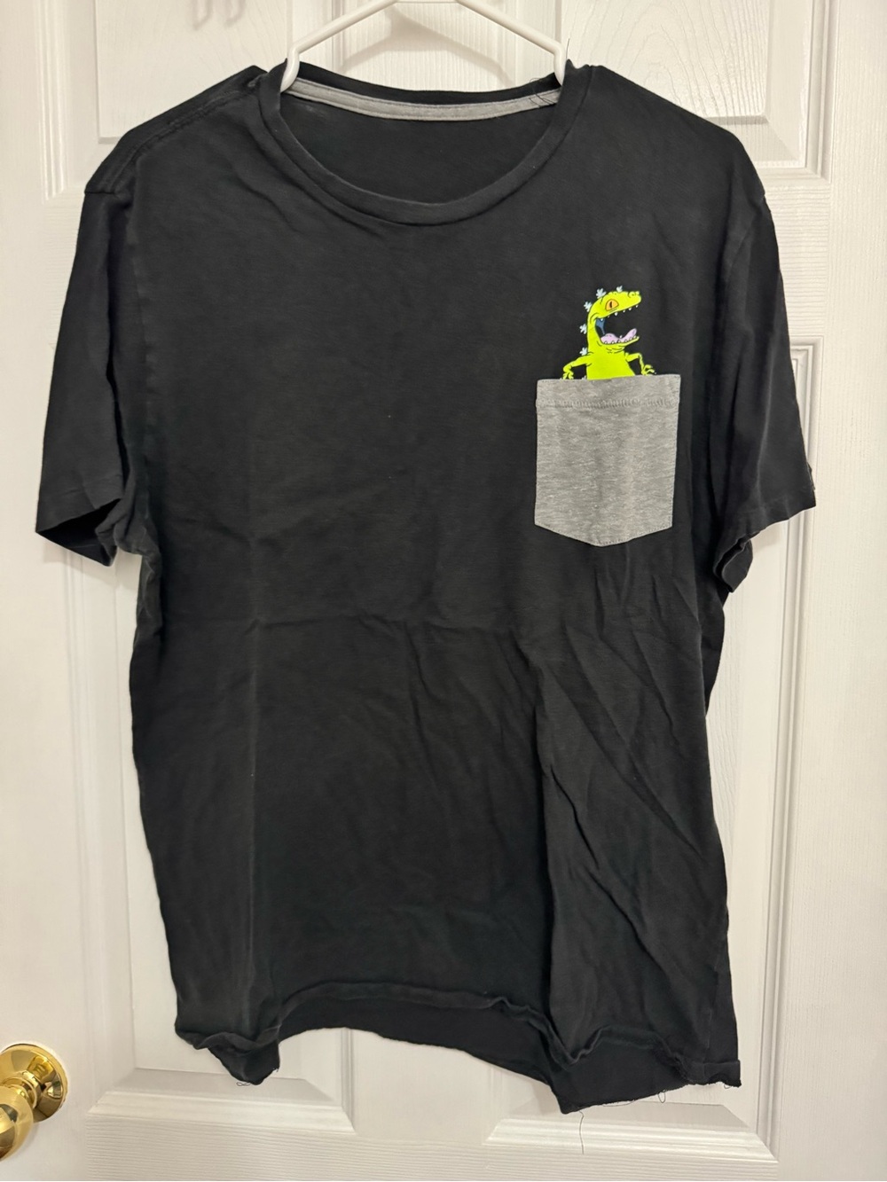 Black Pocket Tee with Neon Green Cartoon Dino